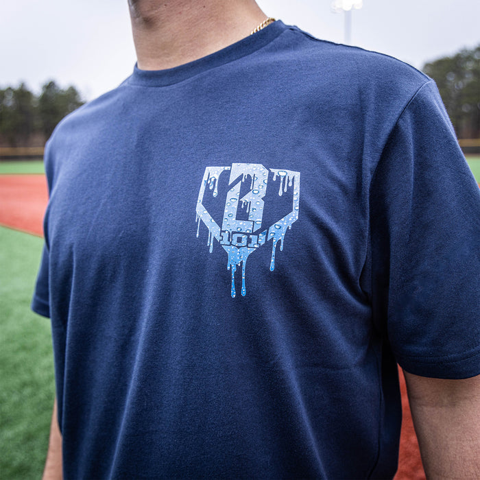 Youth model wearing navy Rain Delay youth graphic tee
