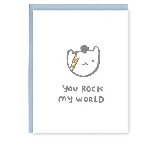 Greeting card with cartoon cat illustration and “YOU ROCK MY WORLD” text