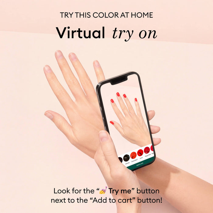 A hand holds a phone with a virtual try-on app, showing Manucurist's Shell and Green Flash nail polish on nails. The app invites users to explore minimalist shades at home and tap “Try me” before adding to cart.