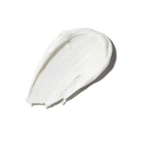 White sunscreen cream swatch with smooth opaque texture