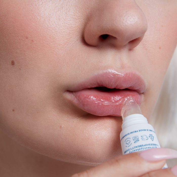 Three Ships-Softserve™ Pomegranate + Shea Butter Barrier-Building Lip Treatment-Skincare-990478500051_7_Application-The Detox Market |