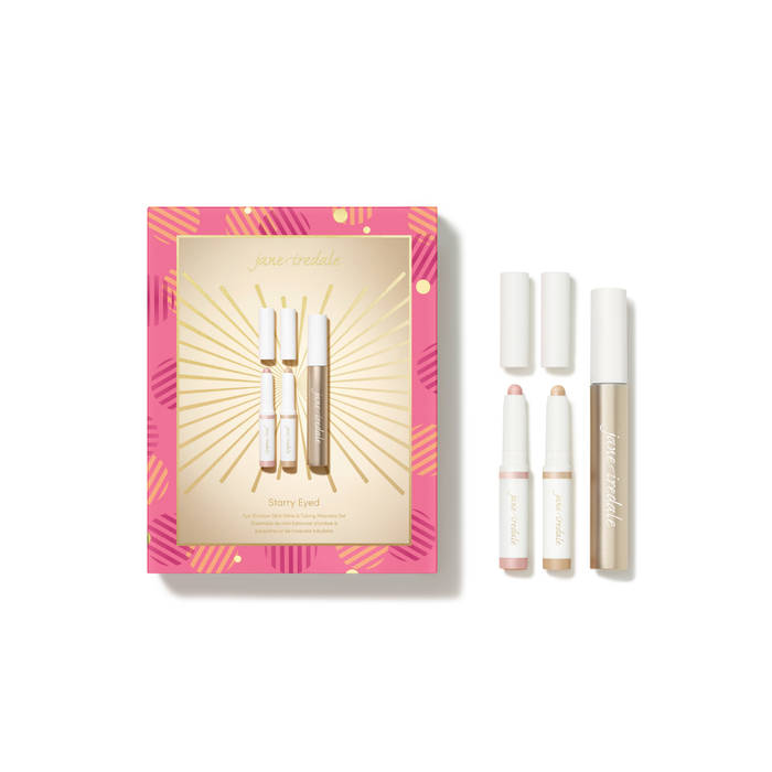 A Jane Reddale 'Glory Eyes!' cosmetic gift set on a white background, featuring a pink and gold outer box alongside four individual cosmetic tubes and sticks.