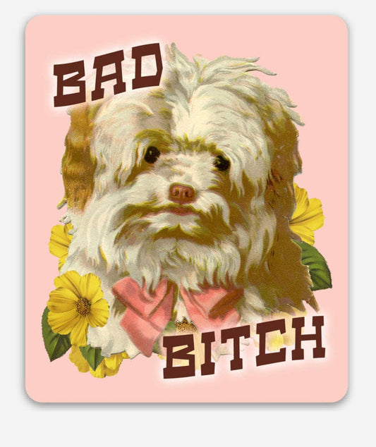 Pink puppy dog sticker with flowers, featuring the humorous "Bad Bitch" phrase, by The Coin Laundry, for decorating laptops or notebooks.