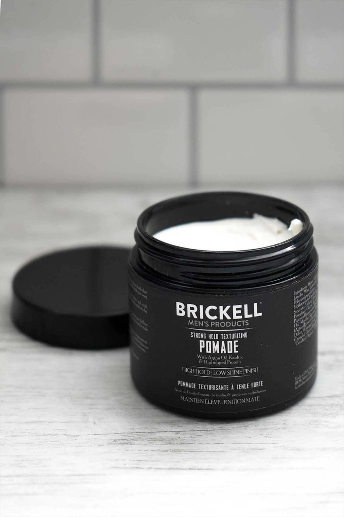 Fiber pomade for pliable style and low shine