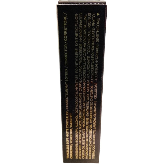 Side view of matte concealer box showing ingredients list in gold text on black packaging