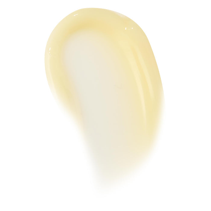 Glossy pale-vanilla swipe of Vanilla Cake lip mask, showing thick balm texture and translucent sheen on a clean white background; ColourPop Lip Mask swatch highlighting creamy, hydrating finish for overnight lip care.