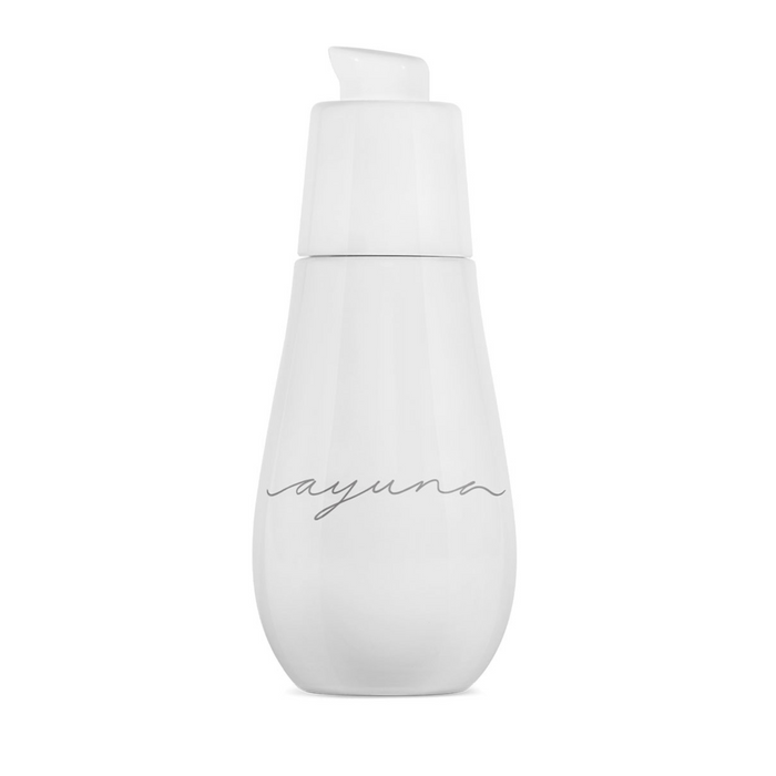 A minimalist white Ayuna Velo [x] skincare bottle with elegant gray cursive script against a clean white background.